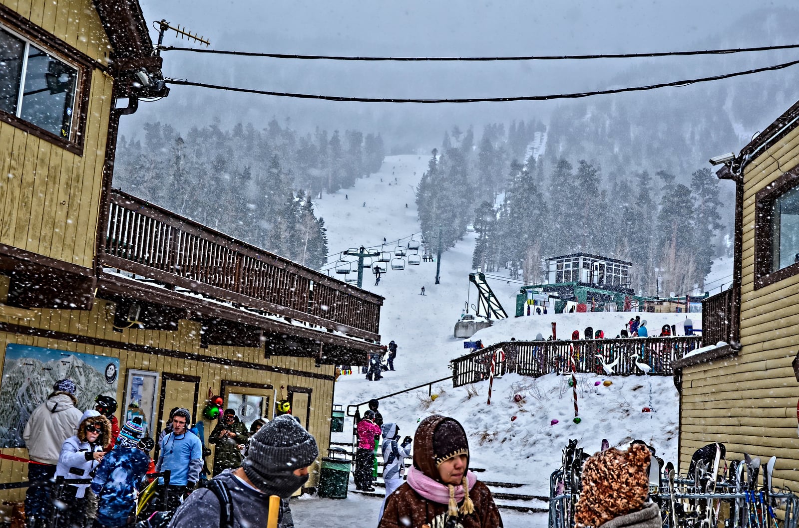 Skiers, lodge buildings, and snowy slopes at Lee Canyon in the Spring Mountains